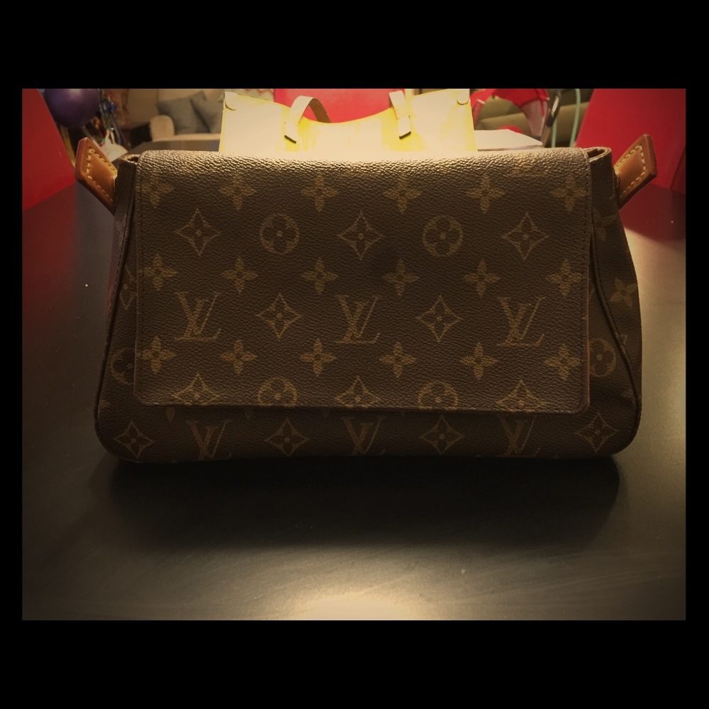 Authentic Louis Vuitton mini looping bag